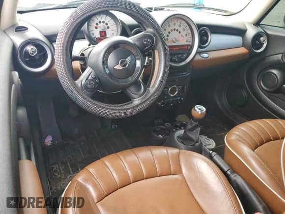 2013 MINI Hardtop with VIN WMWSU3C51DT374477, listed as a Copart auction lot 62654295 with 127,295 mi miles and Salvage title. Bid and sale history available at DreamBid. Image 8.