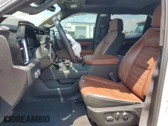 2024 GMC Sierra 1500 Denali Ultimate with VIN 1GTUUHEL5RZ344391, listed as a Copart auction lot 63792275 with 24,840 mi miles and Salvage title. Bid and sale history available at DreamBid. Image 7.