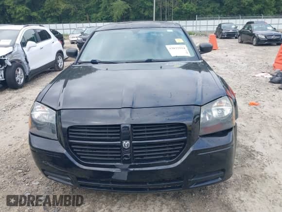 2005 Dodge Magnum SE with VIN 2D4FV48T75H617094, listed as a IAAI auction lot 43032594 with 165,780 mi miles and . Bid and sale history available at DreamBid. Image 13.