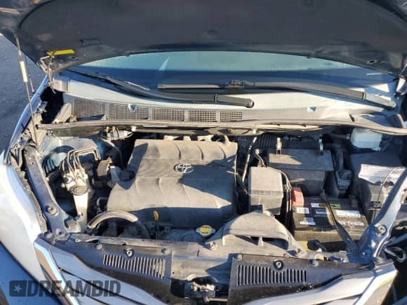 2012 Toyota Sienna XLE with VIN 5TDYK3DC5CS245235, listed as a Copart auction lot 82349425 with 149,275 mi miles and Salvage title. Bid and sale history available at DreamBid. Image 12.