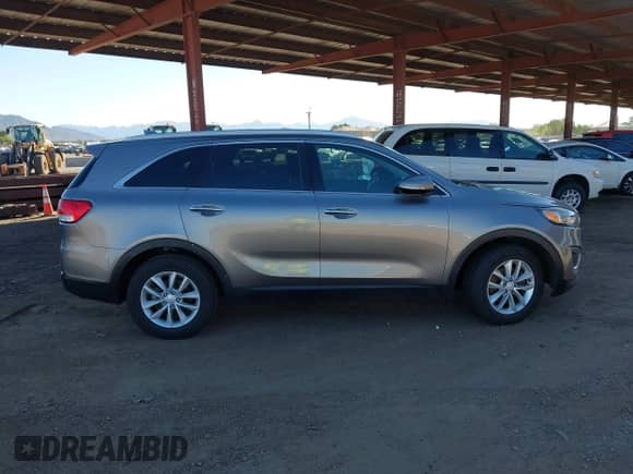 2018 Kia Sorento L with VIN 5XYPG4A35JG413425, listed as a IAAI auction lot 43383687 with 153,635 mi miles and . Bid and sale history available at DreamBid. Image 13.