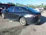 2021 Toyota Camry LE with VIN 4T1C11AK2MU472694, listed as a IAAI auction lot 43340745 with 61,965 mi miles and . Bid and sale history available at DreamBid. Image 3.