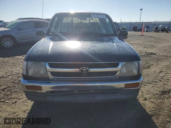 1997 Toyota Tacoma with VIN 4TAVL52N7VZ330736, listed as a Copart auction lot 82432415 with 376,229 mi miles and Salvage title. Bid and sale history available at DreamBid. Image 5.