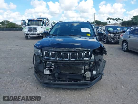 2020 Jeep Compass Latitude with VIN 3C4NJCBB4LT253364, listed as a IAAI auction lot 41565377 with 60,551 mi miles and . Bid and sale history available at DreamBid. Image 13.