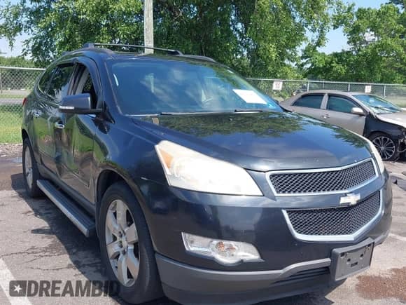 2011 Chevrolet Traverse 2LT z VIN 1GNKVJED0BJ294628, wystawiony jako IAAI lot #42741069 z przebiegiem 220 712 mil mil oraz . Historia ofert i sprzedaży dostępna na DreamBid. Obrazek 1.