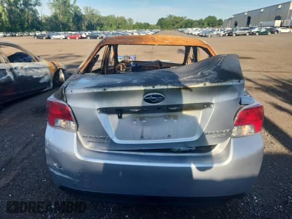 2015 Subaru Impreza z VIN JF1GJAA62FH017290, wystawiony jako Copart lot #65671215 z przebiegiem Nie podano mil oraz Nie do naprawy • Non repairable. Historia ofert i sprzedaży dostępna na DreamBid. Obrazek 6.