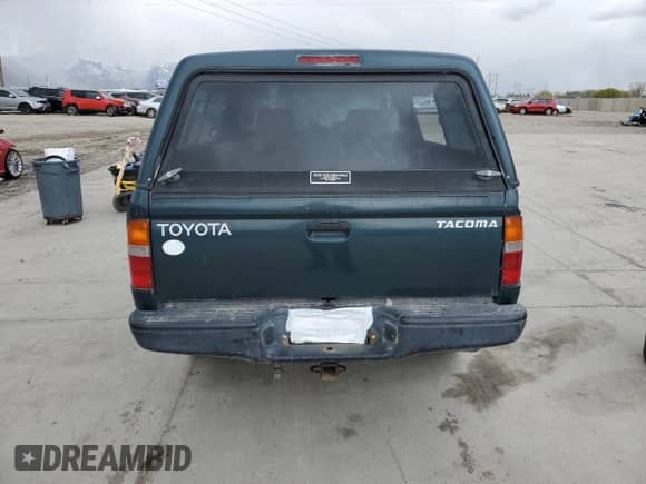 1998 Toyota Tacoma z VIN 4TAPM62N0WZ025379, wystawiony jako Copart lot #51533085 z przebiegiem 127 881 mil mil oraz Szkoda całkowita • Salvage title. Historia ofert i sprzedaży dostępna na DreamBid. Obrazek 6.