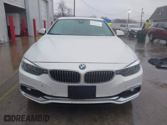 2019 BMW 4 Series 430i xDrive z VIN WBA4W5C51KAE51214, wystawiony jako IAAI lot #41225505 z przebiegiem 52 288 mil mil oraz . Historia ofert i sprzedaży dostępna na DreamBid. Obrazek 12.