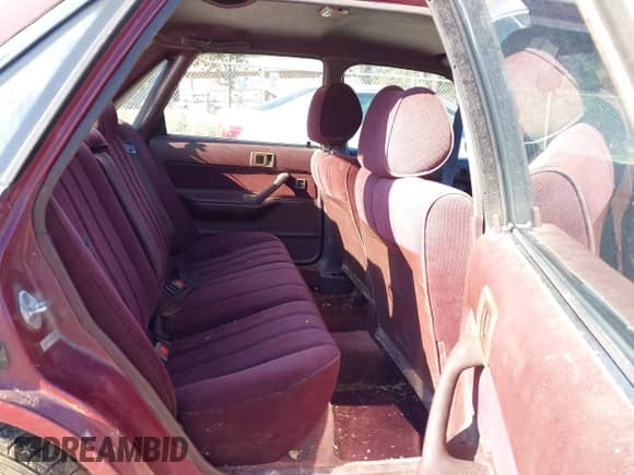 1991 Toyota Camry DLX z VIN 4T1SV21EXMU354893, wystawiony jako IAAI lot #43414642 z przebiegiem 135 939 mil mil oraz . Historia ofert i sprzedaży dostępna na DreamBid. Obrazek 8.