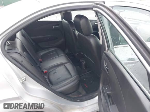 2015 Chevrolet Sonic LTZ with VIN 1G1JE5SB2F4123973, listed as a IAAI auction lot 42428071 with 137,672 mi miles and . Bid and sale history available at DreamBid. Image 8.