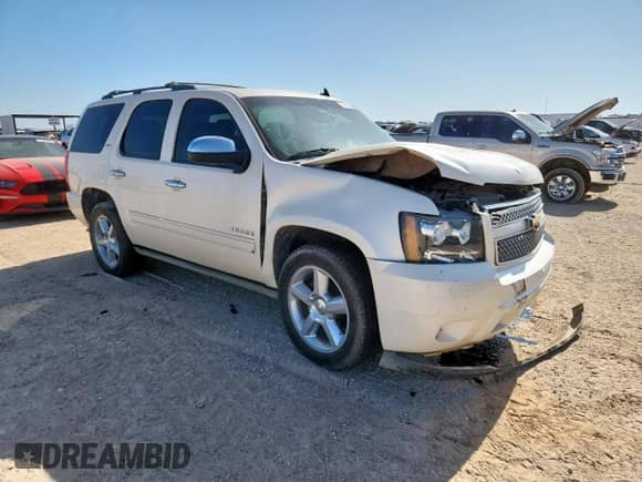 2013 Chevrolet Tahoe LTZ с VIN 1GNSCCE05DR110058, выставлен на аукционе Copart как лот 61679245 с пробегом 230 594 миль миль и Списание • Salvage title. История ставок и продаж доступна на DreamBid. Изображение 4.