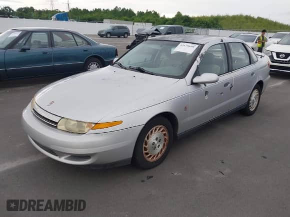 2002 Saturn LS с VIN 1G8JS54F22Y551085, выставлен на аукционе IAAI как лот 43179695 с пробегом 81 084 миль миль и . История ставок и продаж доступна на DreamBid. Изображение 2.