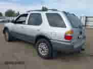 2001 Honda Passport LX z VIN 4S6DM58W714413736, wystawiony jako IAAI lot #42908894 z przebiegiem 203 842 mil mil oraz . Historia ofert i sprzedaży dostępna na DreamBid. Obrazek 3.