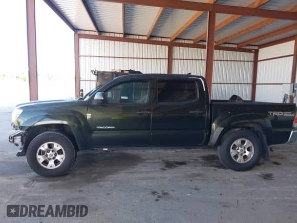 2014 Toyota Tacoma z VIN 3TMLU4EN4EM148475, wystawiony jako IAAI lot #43510986 z przebiegiem 206 348 mil mil oraz . Historia ofert i sprzedaży dostępna na DreamBid. Obrazek 15.