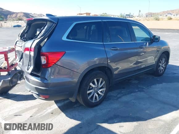 2021 Honda Pilot EX-L z VIN 5FNYF5H5XMB014493, wystawiony jako IAAI lot #43334999 z przebiegiem 178 052 mil mil oraz . Historia ofert i sprzedaży dostępna na DreamBid. Obrazek 4.