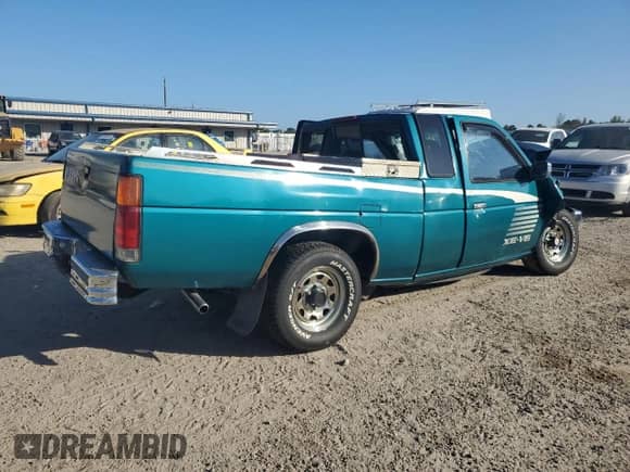 1995 Nissan Frontier XE with VIN 1N6HD16SXSC392683, listed as a Copart auction lot 59881434 with 391,479 mi miles and Salvage title. Bid and sale history available at DreamBid. Image 3.