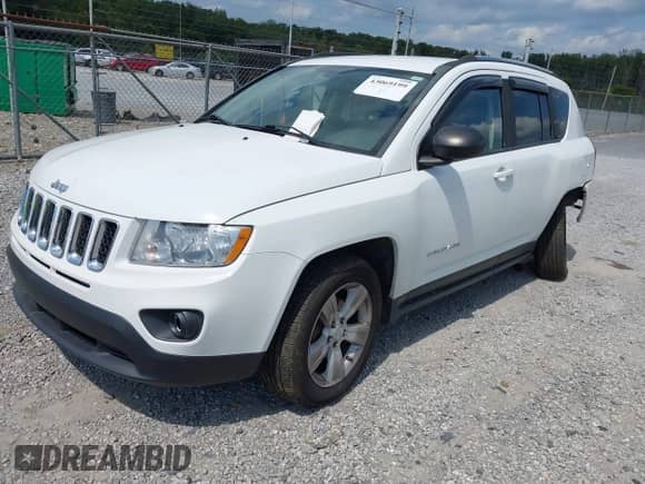 2012 Jeep Compass Sport z VIN 1C4NJDBBXCD608033, wystawiony jako IAAI lot #43069199 z przebiegiem 177 249 mil mil oraz . Historia ofert i sprzedaży dostępna na DreamBid. Obrazek 2.