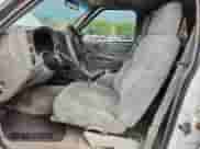 2002 Chevrolet Blazer LS z VIN 1GNDT13W42K206256, wystawiony jako Copart lot #71016145 z przebiegiem 95 775 mil mil oraz Szkoda całkowita • Salvage title. Historia ofert i sprzedaży dostępna na DreamBid. Obrazek 7.