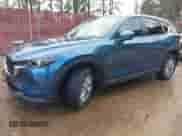 2023 Mazda CX-5 S Carbon Edition z VIN JM3KFBCM2P0235177, wystawiony jako IAAI lot #41209889 z przebiegiem 15 588 mil mil oraz . Historia ofert i sprzedaży dostępna na DreamBid. Obrazek 2.