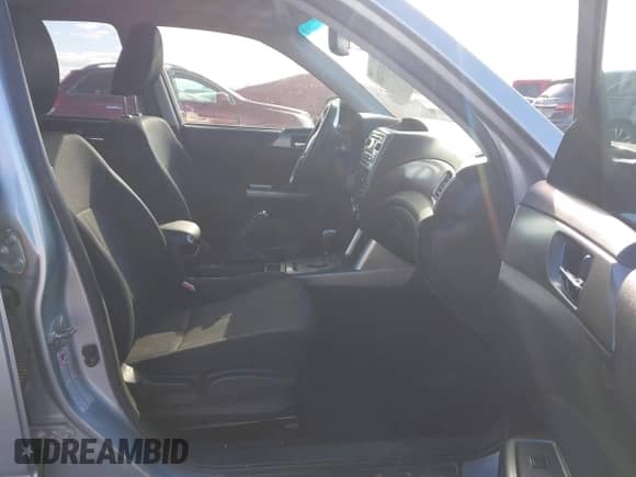 2012 Subaru Forester X Premium z VIN JF2SHADC7CH460727, wystawiony jako IAAI lot #43337416 z przebiegiem 212 232 mil mil oraz . Historia ofert i sprzedaży dostępna na DreamBid. Obrazek 5.