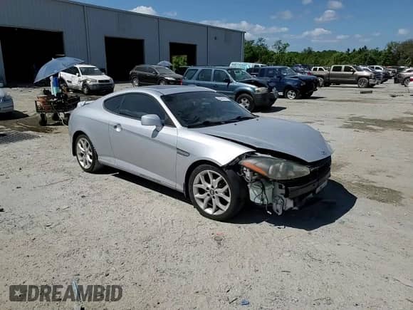 2008 Hyundai Tiburon GT с VIN KMHHN66F88U284030, выставлен на аукционе Copart как лот 53251315 с пробегом Не указан миль и Списание • Salvage title. История ставок и продаж доступна на DreamBid. Изображение 14.