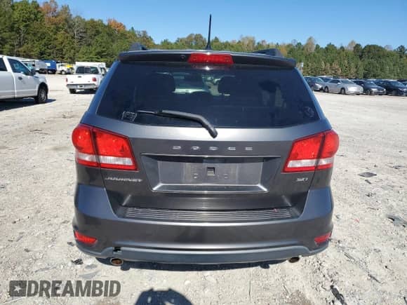 2014 Dodge Journey SXT z VIN 3C4PDCBG7ET164399, wystawiony jako Copart lot #89611415 z przebiegiem 146 309 mil mil oraz Czysty tytuł • Clean title. Historia ofert i sprzedaży dostępna na DreamBid. Obrazek 6.