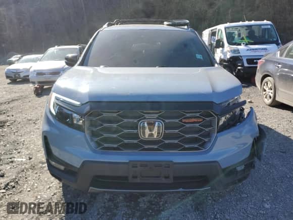 2022 Honda Passport TrailSport with VIN 5FNYF8H62NB004097, listed as a Copart auction lot 52331095 with 27,318 mi miles and Salvage title. Bid and sale history available at DreamBid. Image 5.