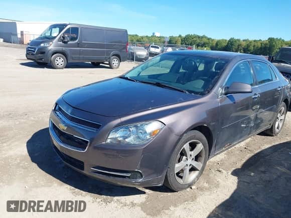 2012 Chevrolet Malibu 1LT with VIN 1G1ZC5E03CF275344, listed as a IAAI auction lot 43347354 with 148,898 mi miles and . Bid and sale history available at DreamBid. Image 2.