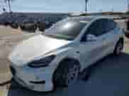 2022 Tesla Model Y Long Range with VIN 7SAYGDEE0NF428074, listed as a Copart auction lot 71721855 with 44,591 mi miles and Salvage title. Bid and sale history available at DreamBid. Image 1.