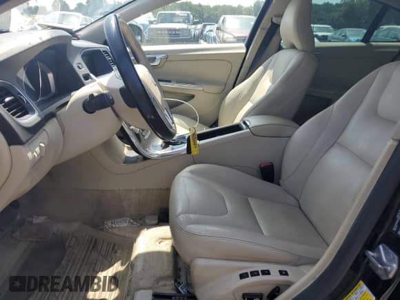 2015 Volvo S60 T5 Drive-E Premier with VIN YV140MFK6F2336518, listed as a Copart auction lot 68339405 with 142,401 mi miles and Salvage title. Bid and sale history available at DreamBid. Image 7.