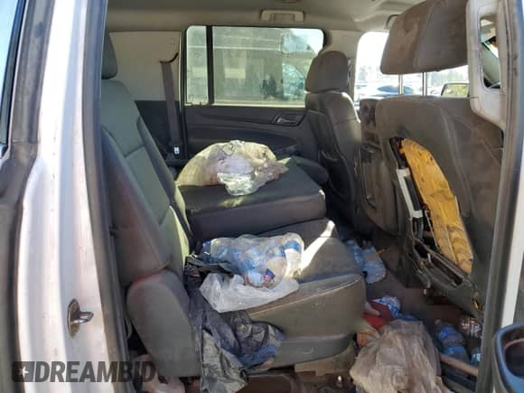 2015 Chevrolet Suburban с VIN 1GNSC5EC7FR626737, выставлен на аукционе Copart как лот 86201054 с пробегом Не указан миль и Чистый • Clean title. История ставок и продаж доступна на DreamBid. Изображение 11.