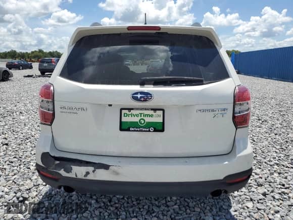 2014 Subaru Forester XT Touring with VIN JF2SJGPCXEH431227, listed as a Copart auction lot 66078405 with 98,060 mi miles and Salvage title. Bid and sale history available at DreamBid. Image 6.