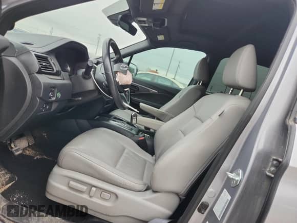 2022 Honda Passport EX-L with VIN 5FNYF8H57NB024420, listed as a Copart auction lot 67348855 with 136,849 mi miles and Salvage title. Bid and sale history available at DreamBid. Image 7.