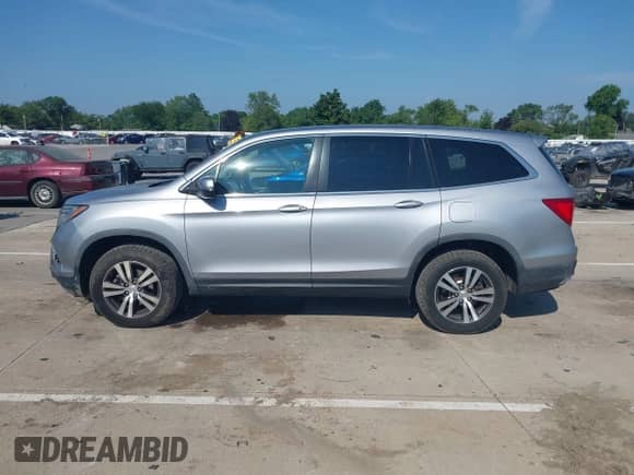 2017 Honda Pilot EX-L with VIN 5FNYF6H77HB069321, listed as a IAAI auction lot 42880282 with 110,987 mi miles and . Bid and sale history available at DreamBid. Image 14.