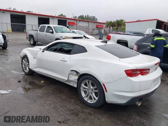 2021 Chevrolet Camaro 1LT с VIN 1G1FB1RX4M0142120, выставлен на аукционе IAAI как лот 41394658 с пробегом 25 477 миль миль и . История ставок и продаж доступна на DreamBid. Изображение 3.