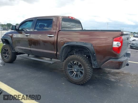 2014 Toyota Tundra 1794 Edition with VIN 5TFGY5F13EX165687, listed as a IAAI auction lot 43294453 with 126,120 mi miles and . Bid and sale history available at DreamBid. Image 3.