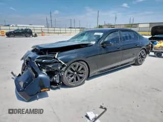2024 BMW 7 Series 740i xDrive with VIN WBA33EH09RCS88132, listed as a Copart auction lot 70487665 with 7,104 mi miles and Salvage title. Bid and sale history available at DreamBid. Image 1.