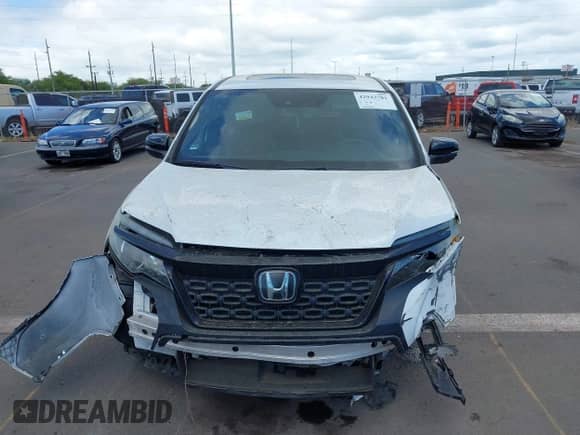 2021 Honda Passport EX-L with VIN 5FNYF7H59MB001083, listed as a IAAI auction lot 42943781 with 56,549 mi miles and . Bid and sale history available at DreamBid. Image 12.