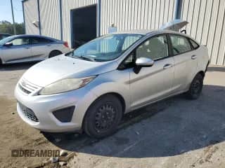 2011 Ford Fiesta S with VIN 3FADP4AJ4BM147553, listed as a Copart auction lot 80146945 with 151,406 mi miles and Salvage title. Bid and sale history available at DreamBid. Image 1.