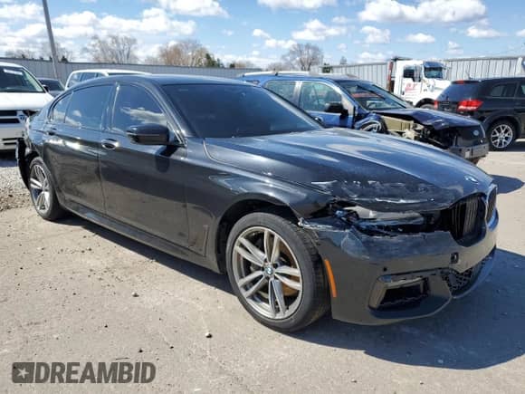 2017 BMW 7 Series 740e xDrive with VIN WBA7J2C33HG497980, listed as a Copart auction lot 50244384 with 115,728 mi miles and . Bid and sale history available at DreamBid. Image 4.