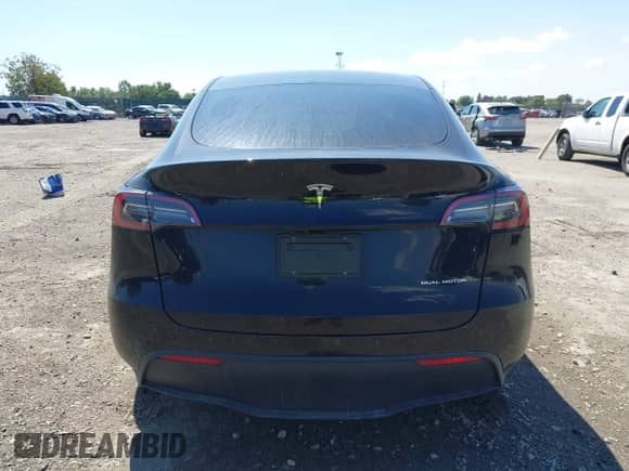 2023 Tesla Model Y Long Range z VIN 7SAYGDEE0PA201841, wystawiony jako IAAI lot #43158634 z przebiegiem 10 356 mil mil oraz . Historia ofert i sprzedaży dostępna na DreamBid. Obrazek 16.