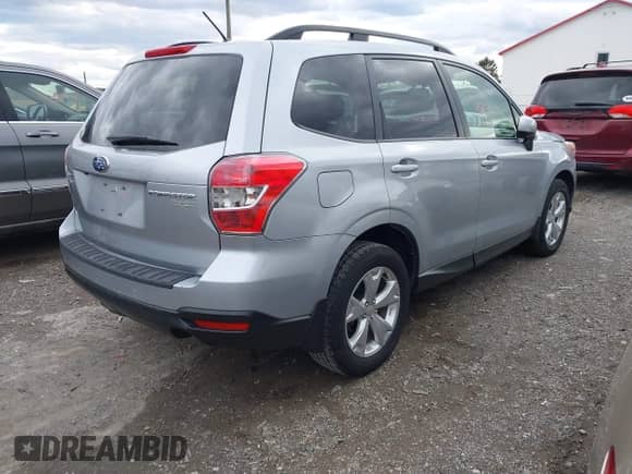 2014 Subaru Forester Premium with VIN JF2SJAEC5EH536824, listed as a IAAI auction lot 43509713 with 73,076 mi miles and . Bid and sale history available at DreamBid. Image 4.