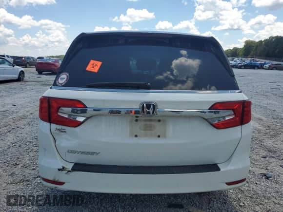 2018 Honda Odyssey LX with VIN 5FNRL6H21JB086686, listed as a Copart auction lot 66273485 with Not provided miles and Salvage title. Bid and sale history available at DreamBid. Image 6.