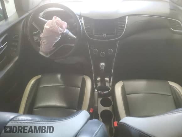 2018 Chevrolet Trax Premier с VIN KL7CJRSB6JB663105, выставлен на аукционе Copart как лот 81232245 с пробегом 131 286 миль миль и Списание • Salvage title. История ставок и продаж доступна на DreamBid. Изображение 8.