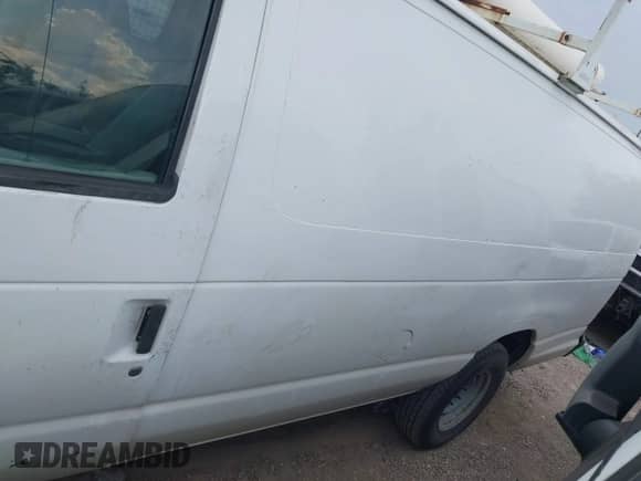 2009 Ford Econoline Cargo Commercial with VIN 1FTSS34L19DA40330, listed as a IAAI auction lot 42848490 with 438,548 mi miles and . Bid and sale history available at DreamBid. Image 14.