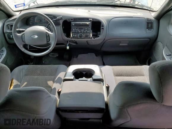 2003 Ford F-150 XLT с VIN 1FTRW07L83KD71471, выставлен на аукционе Copart как лот 69401285 с пробегом 153 556 миль миль и Списание • Salvage title. История ставок и продаж доступна на DreamBid. Изображение 8.