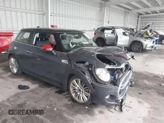 2017 MINI Hardtop Cooper S z VIN WMWXP7C34H2A46293, wystawiony jako IAAI lot #42663253 z przebiegiem 83 964 mil mil oraz . Historia ofert i sprzedaży dostępna na DreamBid. Obrazek 1.