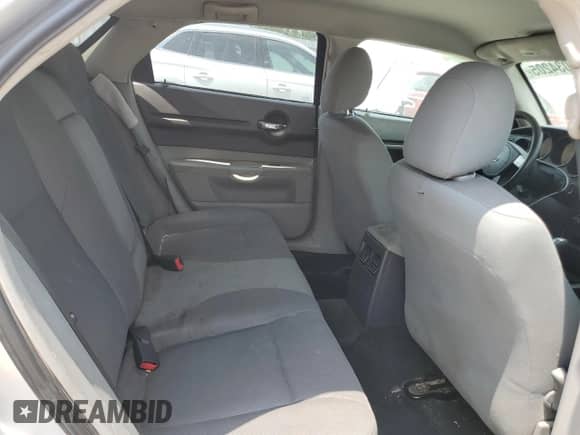 2006 Dodge Magnum z VIN 2D4FV47TX6H251781, wystawiony jako Copart lot #67034205 z przebiegiem 236 619 mil mil oraz Szkoda całkowita • Salvage title. Historia ofert i sprzedaży dostępna na DreamBid. Obrazek 10.