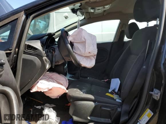 2015 Ford Fiesta SE z VIN 3FADP4BE7FM160109, wystawiony jako Copart lot #70980595 z przebiegiem Nie podano mil oraz Szkoda całkowita • Salvage title. Historia ofert i sprzedaży dostępna na DreamBid. Obrazek 7.