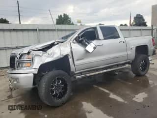 2014 Chevrolet Silverado 1500 High Country z VIN 3GCUKTEJ5EG294206, wystawiony jako Copart lot #65223125 z przebiegiem 187 787 mil mil oraz Szkoda całkowita • Salvage title. Historia ofert i sprzedaży dostępna na DreamBid. Obrazek 1.